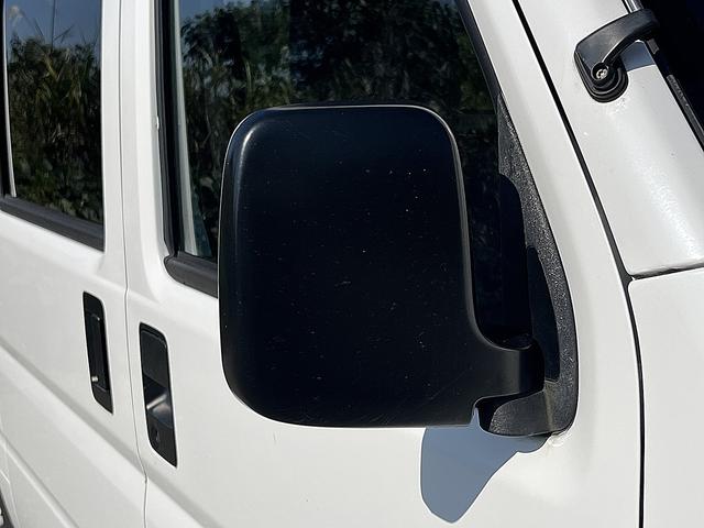 アクティバン SDX 4WD 12か月走行無制限保証付き 事業用登録可能車両 FMAMラジオ ボディ同色バンパー カーエアコン 純正アルミ ハイルーフ スペアタイヤ カップホルダー 光軸調節 手巻きウインドウ サンバイザー(48枚目)