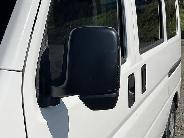 アクティバン SDX 4WD 12か月走行無制限保証付き 事業用登録可能車両 FMAMラジオ ボディ同色バンパー カーエアコン 純正アルミ ハイルーフ スペアタイヤ カップホルダー 光軸調節 手巻きウインドウ サンバイザー(51枚目)