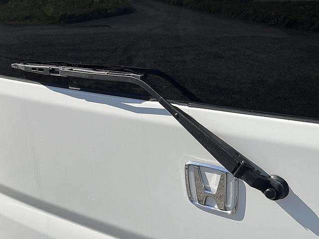 アクティバン SDX 4WD 12か月走行無制限保証付き 事業用登録可能車両 FMAMラジオ ボディ同色バンパー カーエアコン 純正アルミ ハイルーフ スペアタイヤ カップホルダー 光軸調節 手巻きウインドウ サンバイザー(56枚目)