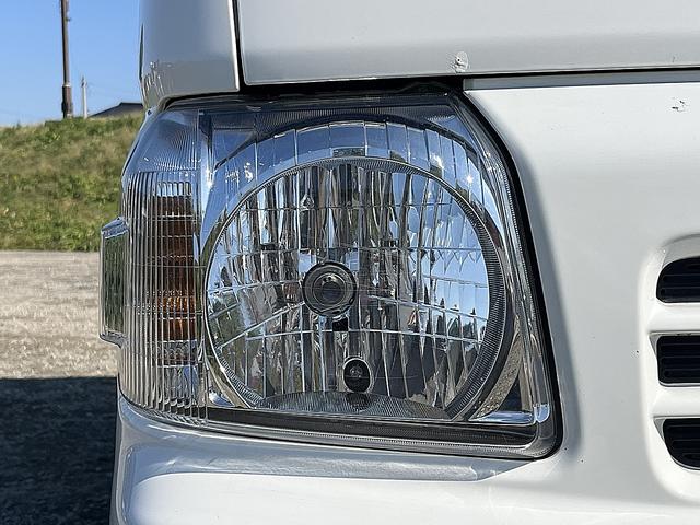 アクティバン SDX 4WD 12か月走行無制限保証付き 事業用登録可能車両 FMAMラジオ ボディ同色バンパー カーエアコン 純正アルミ ハイルーフ スペアタイヤ カップホルダー 光軸調節 手巻きウインドウ サンバイザー(58枚目)