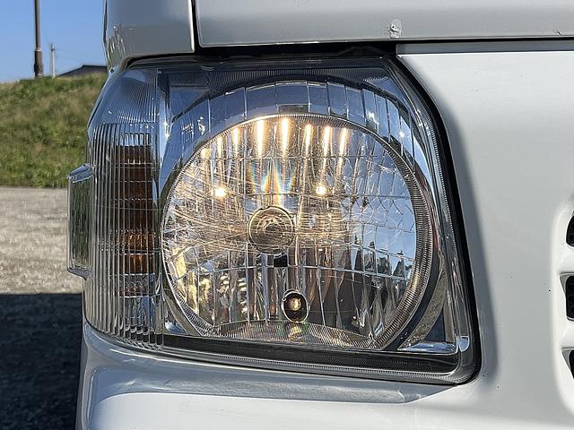 アクティバン SDX 4WD 12か月走行無制限保証付き 事業用登録可能車両 FMAMラジオ ボディ同色バンパー カーエアコン 純正アルミ ハイルーフ スペアタイヤ カップホルダー 光軸調節 手巻きウインドウ サンバイザー(59枚目)