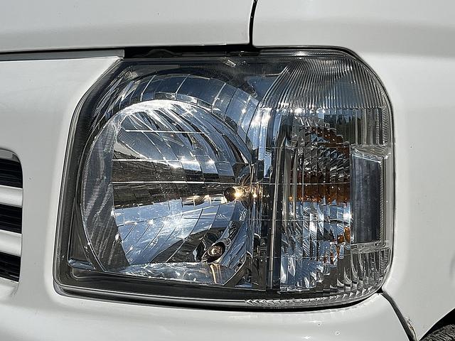 アクティバン SDX 4WD 12か月走行無制限保証付き 事業用登録可能車両 FMAMラジオ ボディ同色バンパー カーエアコン 純正アルミ ハイルーフ スペアタイヤ カップホルダー 光軸調節 手巻きウインドウ サンバイザー(61枚目)