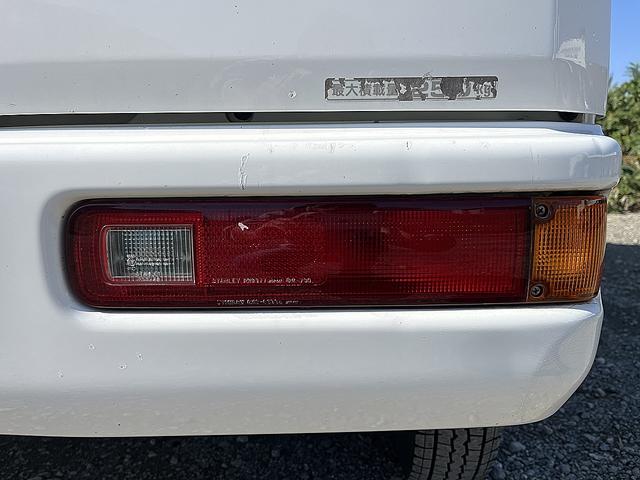 アクティバン SDX 4WD 12か月走行無制限保証付き 事業用登録可能車両 FMAMラジオ ボディ同色バンパー カーエアコン 純正アルミ ハイルーフ スペアタイヤ カップホルダー 光軸調節 手巻きウインドウ サンバイザー(62枚目)