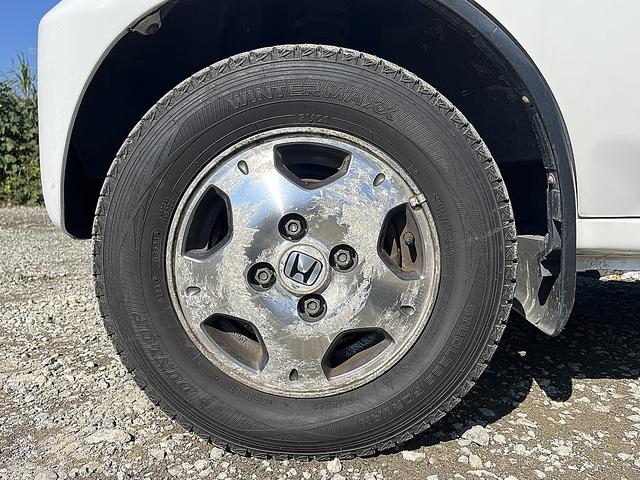 アクティバン SDX 4WD 12か月走行無制限保証付き 事業用登録可能車両 FMAMラジオ ボディ同色バンパー カーエアコン 純正アルミ ハイルーフ スペアタイヤ カップホルダー 光軸調節 手巻きウインドウ サンバイザー(64枚目)