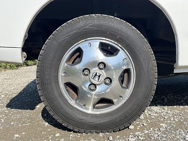 アクティバン SDX 4WD 12か月走行無制限保証付き 事業用登録可能車両 FMAMラジオ ボディ同色バンパー カーエアコン 純正アルミ ハイルーフ スペアタイヤ カップホルダー 光軸調節 手巻きウインドウ サンバイザー(66枚目)