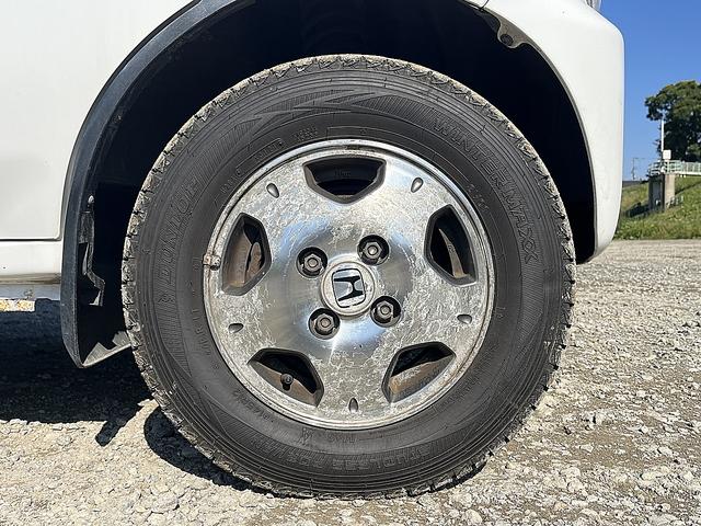 アクティバン SDX 4WD 12か月走行無制限保証付き 事業用登録可能車両 FMAMラジオ ボディ同色バンパー カーエアコン 純正アルミ ハイルーフ スペアタイヤ カップホルダー 光軸調節 手巻きウインドウ サンバイザー(67枚目)