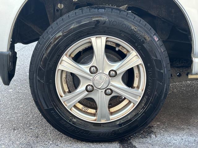 ハイゼットカーゴ クルーズターボ　ハイルーフ　４ＷＤ　【事業用登録・黒ナンバーＯＫ】　１年走行距離無制限保証付き　オートライト　間欠ワイパー　ＭＯＭＯステアリング　電動格納ミラー　全席パワーウインドウ　ラジオ／ＣＤプレイヤー　エアコン（67枚目）