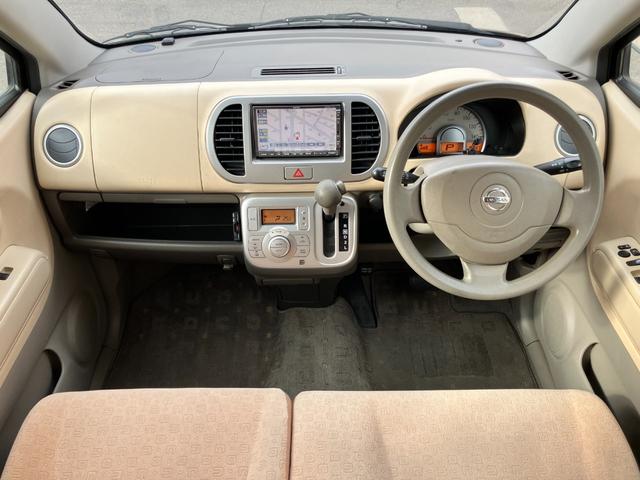 モコ Ｅ　【禁煙車】　純正ＨＤＤナビ／音楽録音機能／ＣＤ／ラジオ　ＡＢＳ　盗難防止機能　オートエアコン　ベンチシート　ブリヂストン製ＮＥＸＴＲＹ装着　ヘッドライトレベライザー　助手席シートアンダーボックス（7枚目）