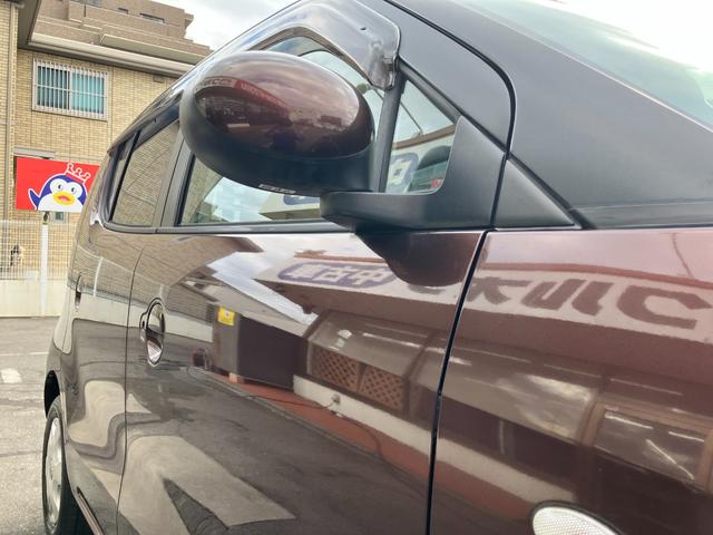 モコ Ｅ　【禁煙車】　純正ＨＤＤナビ／音楽録音機能／ＣＤ／ラジオ　ＡＢＳ　盗難防止機能　オートエアコン　ベンチシート　ブリヂストン製ＮＥＸＴＲＹ装着　ヘッドライトレベライザー　助手席シートアンダーボックス（56枚目）