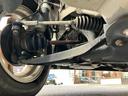 Ｅ　【禁煙車】　【走行距離３４，０００キロ未満】１２ヶ月走行距離無制限保証付き　１３インチ社外アルミホイール　オートエアコン　パワーウインドウ　ＣＤ／ＭＤプレイヤー　パワーステアリング　電動格納ミラー（68枚目）