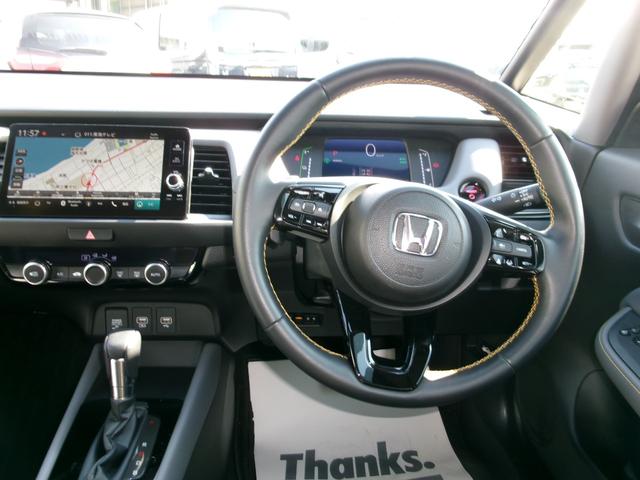 ｅ：ＨＥＶ　ＲＳ　ＨＯＮＤＡ　ＣＯＮＮＥＣＴディスプレイ＋ＥＴＣ２．０車載器　Ｂカメラ　ブル－トゥ－ス　ワンセグＴＶ　ドラレコ前　スマ－トキ－　　ＬＥＤヘッドライト　１６インチＡＷ　自動パ－キング　記録簿　ワンオーナ(5枚目)