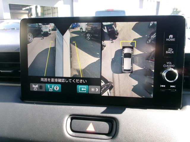 ヴェゼル e:HEV Z ホンダブラインドスポットインフォメーション 後退出庫サポ-ト マルチビューカメラシステム 運転席+助手席シ-トヒ-タ コンビシ-ト 18インチAW ETC2.0 フルセグTV 記録簿ワンオーナ 禁煙車(8枚目)