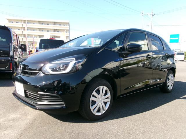 フィット ホーム　ギャザ－ズナビ（ＶＸＵ－２４５ＦＴＩ）　Ｂカメラ　フルセグＴＶ　ブル－トゥ－ス　ＤＶＤ再生　ＣＤ　ＥＴＣ　ＬＥＤヘッドライト　自動パ－キング　記録簿　ワンオーナ　当店デモカ－仕様車　禁煙車（2枚目）