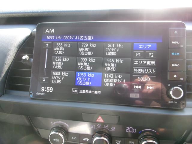 フィット ホーム　ギャザ－ズナビ（ＶＸＵ－２４５ＦＴＩ）　Ｂカメラ　フルセグＴＶ　ブル－トゥ－ス　ＤＶＤ再生　ＣＤ　ＥＴＣ　ＬＥＤヘッドライト　自動パ－キング　記録簿　ワンオーナ　当店デモカ－仕様車　禁煙車（6枚目）