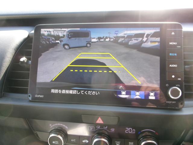 フィット ホーム　ギャザ－ズナビ（ＶＸＵ－２４５ＦＴＩ）　Ｂカメラ　フルセグＴＶ　ブル－トゥ－ス　ＤＶＤ再生　ＣＤ　ＥＴＣ　ＬＥＤヘッドライト　自動パ－キング　記録簿　ワンオーナ　当店デモカ－仕様車　禁煙車（7枚目）