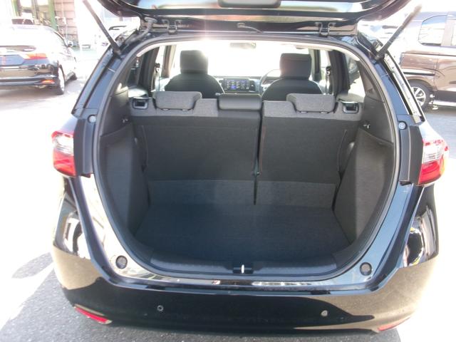 フィット ホーム　ギャザ－ズナビ（ＶＸＵ－２４５ＦＴＩ）　Ｂカメラ　フルセグＴＶ　ブル－トゥ－ス　ＤＶＤ再生　ＣＤ　ＥＴＣ　ＬＥＤヘッドライト　自動パ－キング　記録簿　ワンオーナ　当店デモカ－仕様車　禁煙車（22枚目）