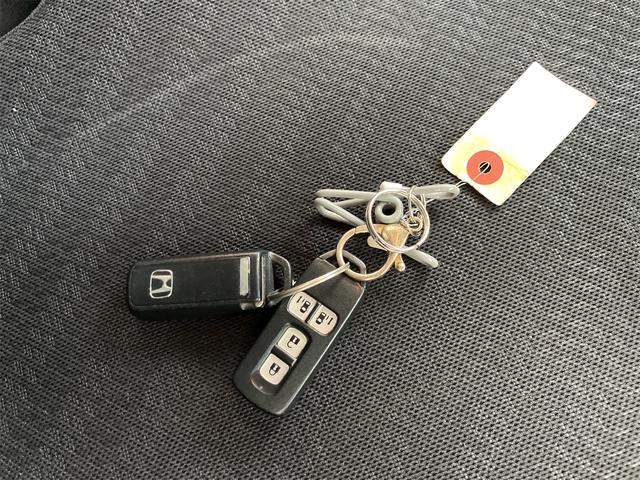 N-BOXカスタム G・Lパッケージ バックカメラ 両側電動スライドドア ナビ オートライト HID スマートキー アイドリングストップ 電動格納ミラー CVT 盗難防止システム ABS ESC エアコン パワーステアリング(10枚目)