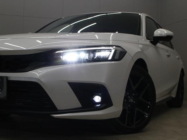 シビック ＥＸ　６速マニュアル　純正９型コネクトナビ　バックカメラ　ドラレコ前後　ＢＯＳＥプレミアムサウンド　シートヒーター　ワイヤレス充電器　アダプティブドライビングビーム　純正１８インチアルミ　ＥＴＣ　禁煙車（22枚目）