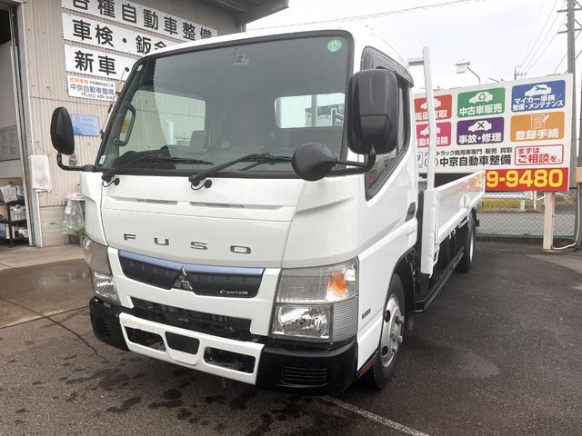 キャンター 　２トン　標準平ロング　デュオニックＡＴ　２ｔ　荷台板　荷台内寸法　Ｌ４３０ｃｍ　Ｗ１８０ｃｍ　荷台地上高８７ｃｍ　車両総重量５トン未満　レーンセンサー　社外ナビ　荷台ペイント（5枚目）