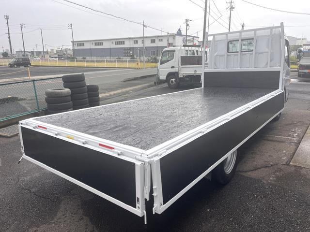 キャンター 　２トン　標準平ロング　デュオニックＡＴ　２ｔ　荷台板　荷台内寸法　Ｌ４３０ｃｍ　Ｗ１８０ｃｍ　荷台地上高８７ｃｍ　車両総重量５トン未満　レーンセンサー　社外ナビ　荷台ペイント（10枚目）