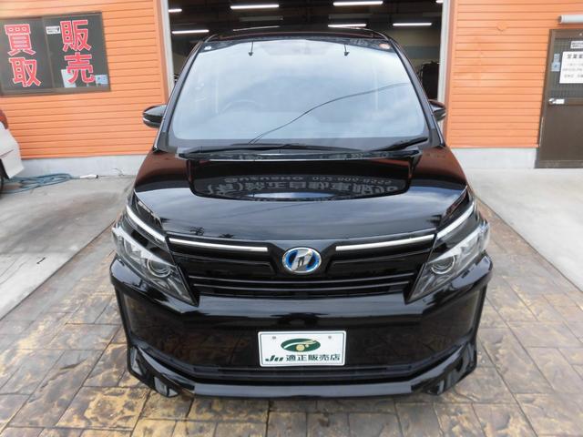 ヴォクシー ハイブリッドＶ　純正９インチナビ　フルセグ　Ｂｌｕｅｔｏｏｔｈ　バックカメラ　ＥＴＣ　両側パワースライドドア　クルーズコントロール　ＬＥＤヘッドライト　スペアキー　シートヒーター　フリップダウンモニター　置くだけ充電（2枚目）