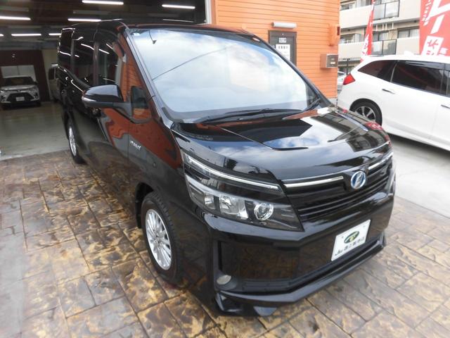 ヴォクシー ハイブリッドＶ　純正９インチナビ　フルセグ　Ｂｌｕｅｔｏｏｔｈ　バックカメラ　ＥＴＣ　両側パワースライドドア　クルーズコントロール　ＬＥＤヘッドライト　スペアキー　シートヒーター　フリップダウンモニター　置くだけ充電（6枚目）