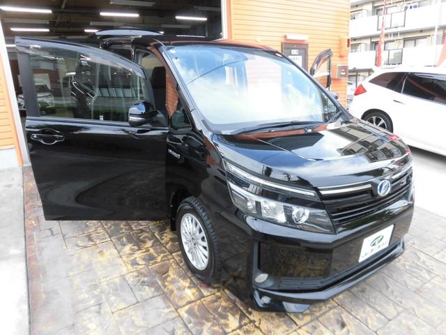 ヴォクシー ハイブリッドＶ　純正９インチナビ　フルセグ　Ｂｌｕｅｔｏｏｔｈ　バックカメラ　ＥＴＣ　両側パワースライドドア　クルーズコントロール　ＬＥＤヘッドライト　スペアキー　シートヒーター　フリップダウンモニター　置くだけ充電（30枚目）