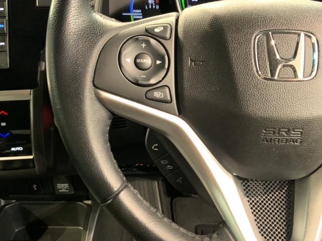 フィットハイブリッド Ｌ　ホンダセンシング　最長５年保証　ナビＶＸＭ－１９４Ｃｉ　Ｒカメラ　ＢＴオ－ディオ　ドラレコ　ＥＴＣ　ＬＥＤライト　ＶＳＡ　クルコン　フォグ　ドアバイザー　スマートキー　盗難防止装置　整備記録簿　ＡＡＣ　Ｗエアバッグ（10枚目）
