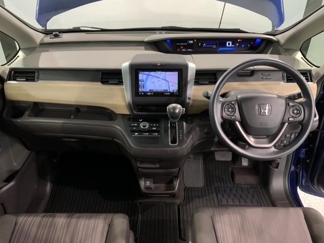 フリード Ｇ・ホンダセンシング　１年保証　ワンオ－ナ－　ナビ　ＴＶ　Ｒカメラ　ＣＤ録音　ＢＴオ－ディオ　ＤＶＤ　ＥＴＣ　両側電動ドア　ＶＳＡ　クルコン　スマ－トキ－　盗難防止装置　整備記録簿　ＡＡＣ　スペアキ－　ドアバイザ－　Ｆセグ（9枚目）