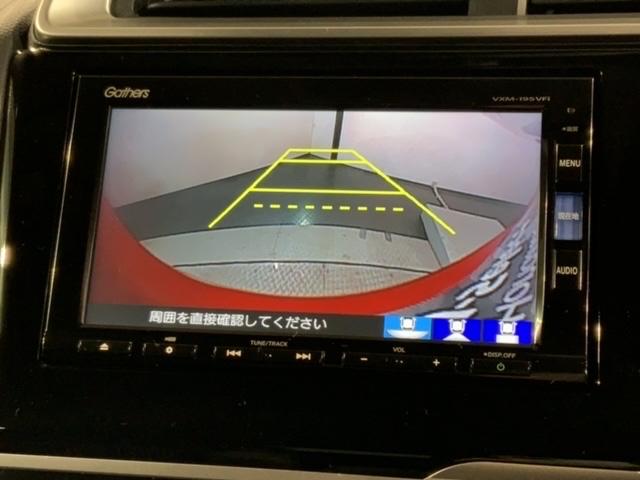 フィットハイブリッド Ｌホンダセンシング　最長５年保証　ナビＶＸＭ－１９５ＶＦｉ　ＴＶ　Ｒカメラ　ＣＤ録音　ＢＴオ－ディオ　ＤＶＤ　ドラレコ　ＥＴＣ　ＬＥＤライト　ＶＳＡ　クルコン　フォグ　スマートキー　盗難防止装置　整備記録簿　ＡＡＣ（7枚目）