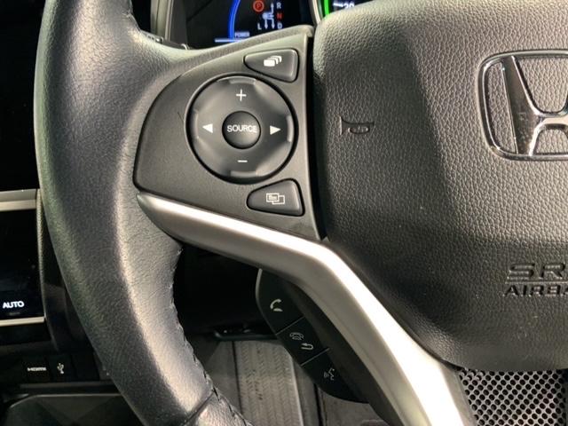 フィットハイブリッド Ｌホンダセンシング　最長５年保証　ナビＶＸＭ－１９５ＶＦｉ　ＴＶ　Ｒカメラ　ＣＤ録音　ＢＴオ－ディオ　ＤＶＤ　ドラレコ　ＥＴＣ　ＬＥＤライト　ＶＳＡ　クルコン　フォグ　スマートキー　盗難防止装置　整備記録簿　ＡＡＣ（10枚目）