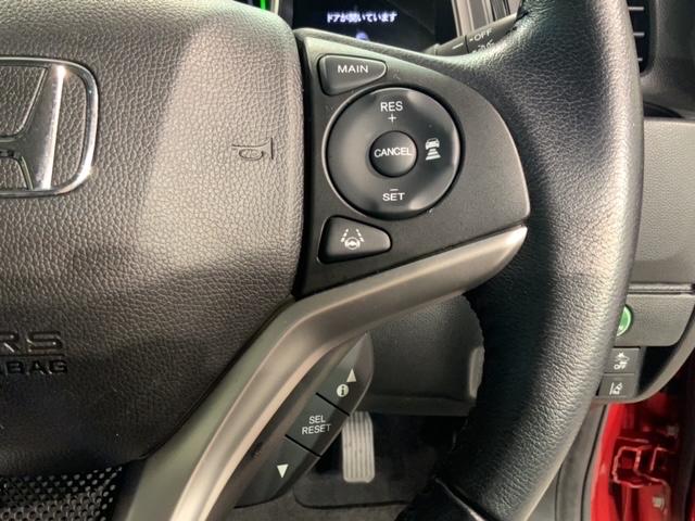 フィットハイブリッド Ｌホンダセンシング　最長５年保証　ナビＶＸＭ－１９５ＶＦｉ　ＴＶ　Ｒカメラ　ＣＤ録音　ＢＴオ－ディオ　ＤＶＤ　ドラレコ　ＥＴＣ　ＬＥＤライト　ＶＳＡ　クルコン　フォグ　スマートキー　盗難防止装置　整備記録簿　ＡＡＣ（11枚目）