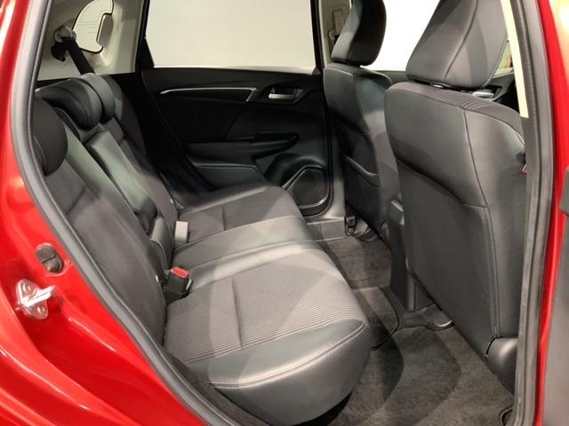 フィットハイブリッド Ｌホンダセンシング　最長５年保証　ナビＶＸＭ－１９５ＶＦｉ　ＴＶ　Ｒカメラ　ＣＤ録音　ＢＴオ－ディオ　ＤＶＤ　ドラレコ　ＥＴＣ　ＬＥＤライト　ＶＳＡ　クルコン　フォグ　スマートキー　盗難防止装置　整備記録簿　ＡＡＣ（18枚目）