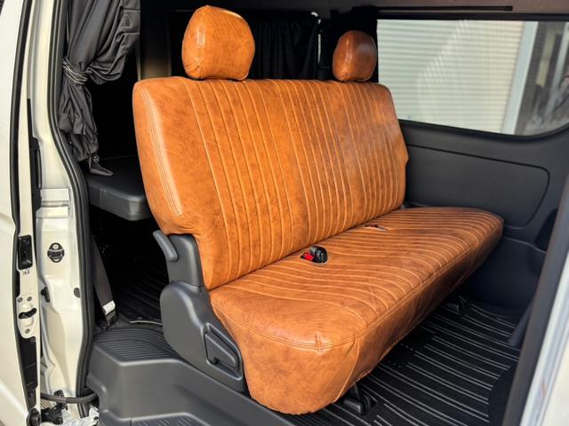 ハイエースバン ロングスーパーＧＬ　ワンオーナー　セーフティセンス　両側パワースライドドア　　　ケンウッド９インチフローディングナビ　パノラミックビュー　ガルシアシスコムーン１６ｉｎＡＷ　オープンカントリー　ベッドキット車中泊仕様（22枚目）