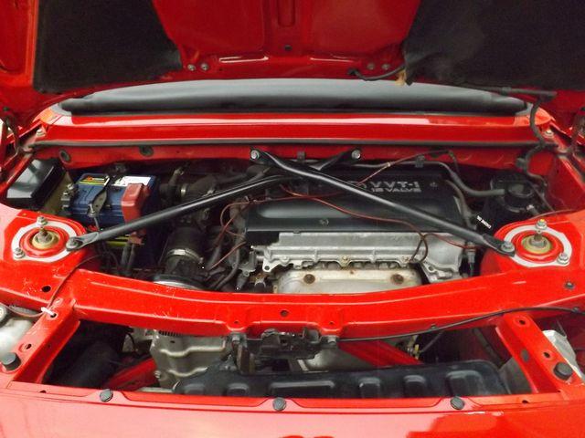 Sエディション 6MT・TRD製クイックシフト・シフト革巻直済・ETC・純正エンジンイグニッションプッシュスタート付・社外製HIDヘッド・レイズ製前後17インチAW・TEIN製車高調・社外製マフラー・(6枚目)
