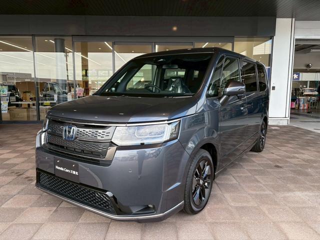 ステップワゴン ｅ：ＨＥＶスパーダ　９インチ純正ナビ　ＥＴＣ車載器　ホンダセンシング　運転席、助手席シートヒーター　両側電動スライドドア　新車未登録（8枚目）