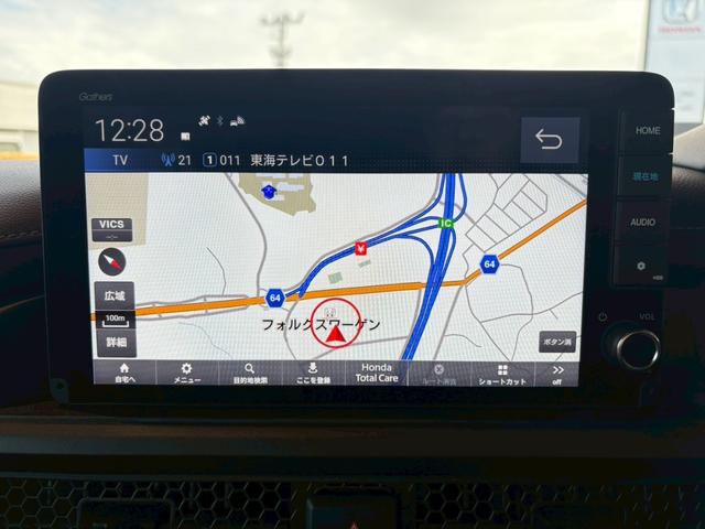 ステップワゴン ｅ：ＨＥＶスパーダ　９インチ純正ナビ　ＥＴＣ車載器　ホンダセンシング　運転席、助手席シートヒーター　両側電動スライドドア　新車未登録（24枚目）