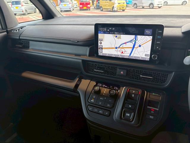 ステップワゴン ｅ：ＨＥＶスパーダ　９インチ純正ナビ　ＥＴＣ車載器　ホンダセンシング　運転席、助手席シートヒーター　両側電動スライドドア　新車未登録（25枚目）