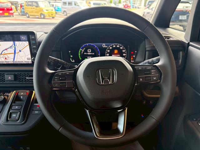 ステップワゴン ｅ：ＨＥＶスパーダ　９インチ純正ナビ　ＥＴＣ車載器　ホンダセンシング　運転席、助手席シートヒーター　両側電動スライドドア　新車未登録（28枚目）