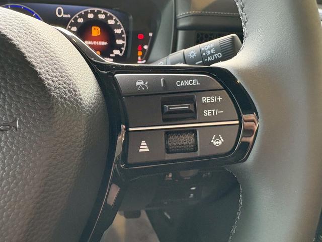 ステップワゴン ｅ：ＨＥＶスパーダ　９インチ純正ナビ　ＥＴＣ車載器　ホンダセンシング　運転席、助手席シートヒーター　両側電動スライドドア　新車未登録（30枚目）