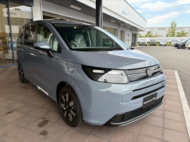 フリード エアー　ＥＸ　７人乗り　新車未登録　ホンダセンシング　シートヒーター　リア席クーラー（14枚目）