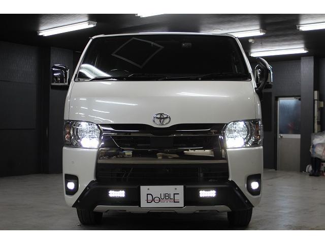 ハイエースバン スーパーＧＬ　ダークプライムＩＩ　７型ｘ４ＷＤｘセ－フティセンスｘＴＲＤフロントスポイラーｘマッドフラップｘ１５ＡＷｘインテリジェントクリアランスソナ－ｘ両側電動スライドｘハ－フレザ－ｘ純正ナビＴＶｘパノラミックビュ－モニタ－ｘＥＴＣ（42枚目）