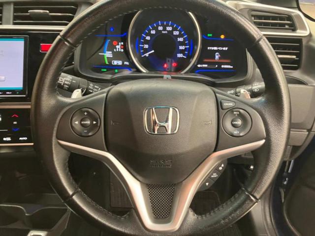 フィットハイブリッド ハイブリッド・Sパッケージ 新品タイヤ/保証書/純正 8インチ SDナビ/シティーブレーキアクティブシステム(ホンダ)/ヘッドランプ LED/Bluetooth接続/EBD付ABS/横滑り防止装置/アイドリングストップ 禁煙車(12枚目)