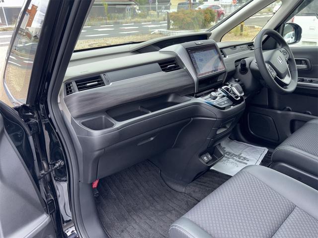 フリードハイブリッド ハイブリッド・G 車検2年付き!!、純正ナビ(CD、DVD、TV、ラジオ、Bluetooth、USB)、ETC、ドラレコFR、ホンダセンシング、LEDヘッドライト、両側パワースライドドア、シートヒーター、純正15アルミ(31枚目)