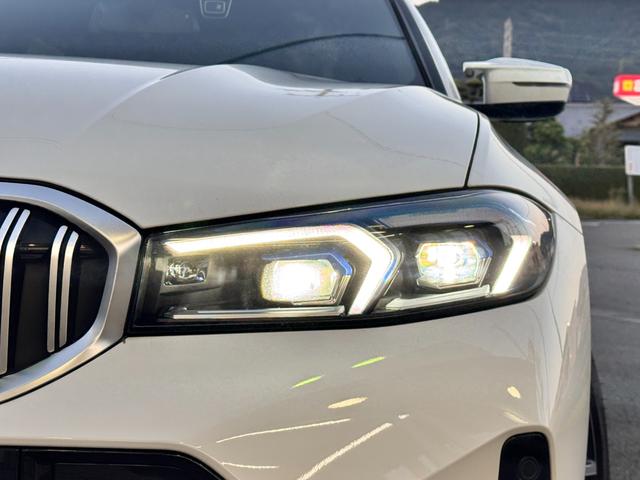 ３シリーズ ３２０ｉツーリング　Ｍスポーツ　仕入車両・コンフォートＰＫＧ・１８インチＡＷ・ＡｐｐｌｅＣａｒＰｌａｙ・アンビエントライト・全方位カメラ・ＨＵＤ・オートホールド・パドルシフト・電動リアゲート・電動シート・シートヒーター・ミラーＥＴＣ（21枚目）
