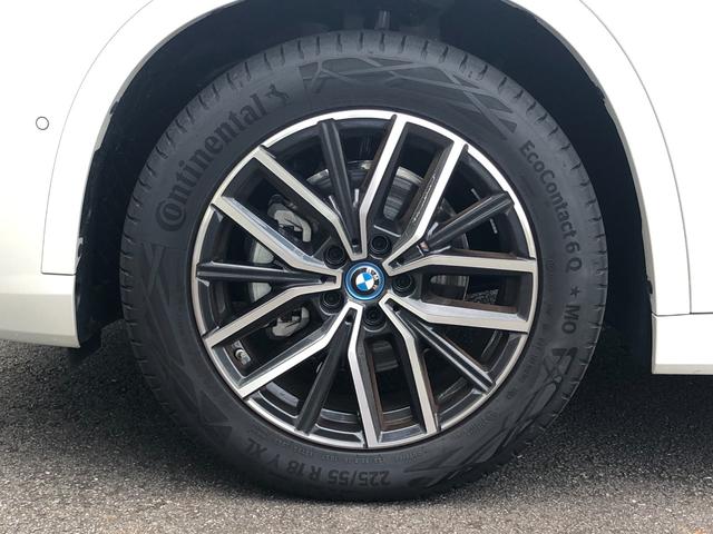 ｉＸ１ ｅＤｒｉｖｅ　２０　Ｍスポーツ　試乗車・テクノロジーＰＫＧ・１８インチＡＷ・ＡＣＣ　ＡｐｐｌｅＣａｒＰｌａｙ・ａｎｄｒｏｉｄオート・アンビエントライト・全方位カメラ・ワイヤレス充電・ＨＵＤ・オートホールド・ミラーＥＴＣ（65枚目）