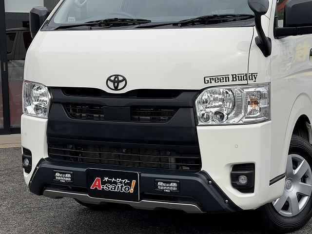ハイエースバン トイファクトリー製グリーンバディ/ディーゼル4WD/電装パッケージ/2段ベッドマット/FFヒーター/TRDフロントスポイラー/ライノラックルーフラック・オーニング/リアラダー/トヨタTSS(2枚目)