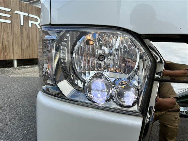 ハイエースバン ロングスーパーGL モデリスタフロントエアロ 15インチアルミホイール セーフティセンス バックカメラ ETC SDナビ Bluetooth フルセグ ハーフレザーシート 両側スライドドア オートハイビーム 盗難防止装置(31枚目)