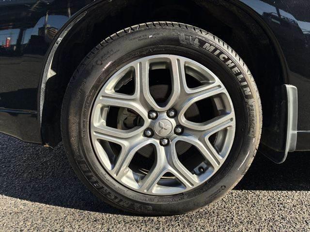 アウトランダーＰＨＥＶ Ｇナビパッケージ　４ＷＤ　純正ＳＤナビ　バックカメラ　禁煙車　衝突軽減ブレーキ　フルセグＴＶ　レーダークルーズコントロール　Ｂｌｕｅｔｏｏｔｈ　ＨＩＤヘッドライト　シートヒーター　スマートキー　ＭＴモード付シフト（31枚目）