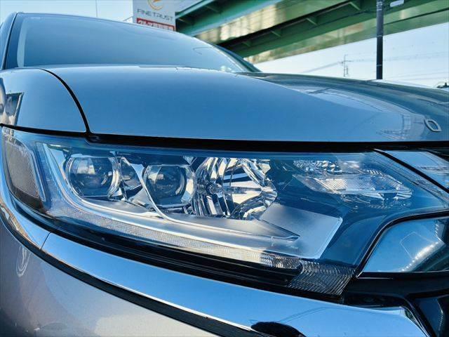 アウトランダーＰＨＥＶ Ｇ　プレミアムパッケージ　デジタルインナーミラー　パワーバックドア　全方位カメラ　４ＷＤ　ＥＴＣ　本革シート　衝突軽減ブレーキ　純正ＳＤナビ　レーダークルーズコントロール　ＡＣ１００Ｖ電源　パワーシート　ＬＥＤヘッドライト（24枚目）